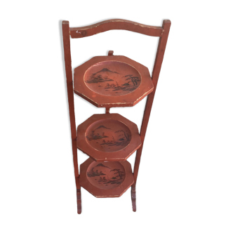 Chinese folding pedestal table in red lacquered wood