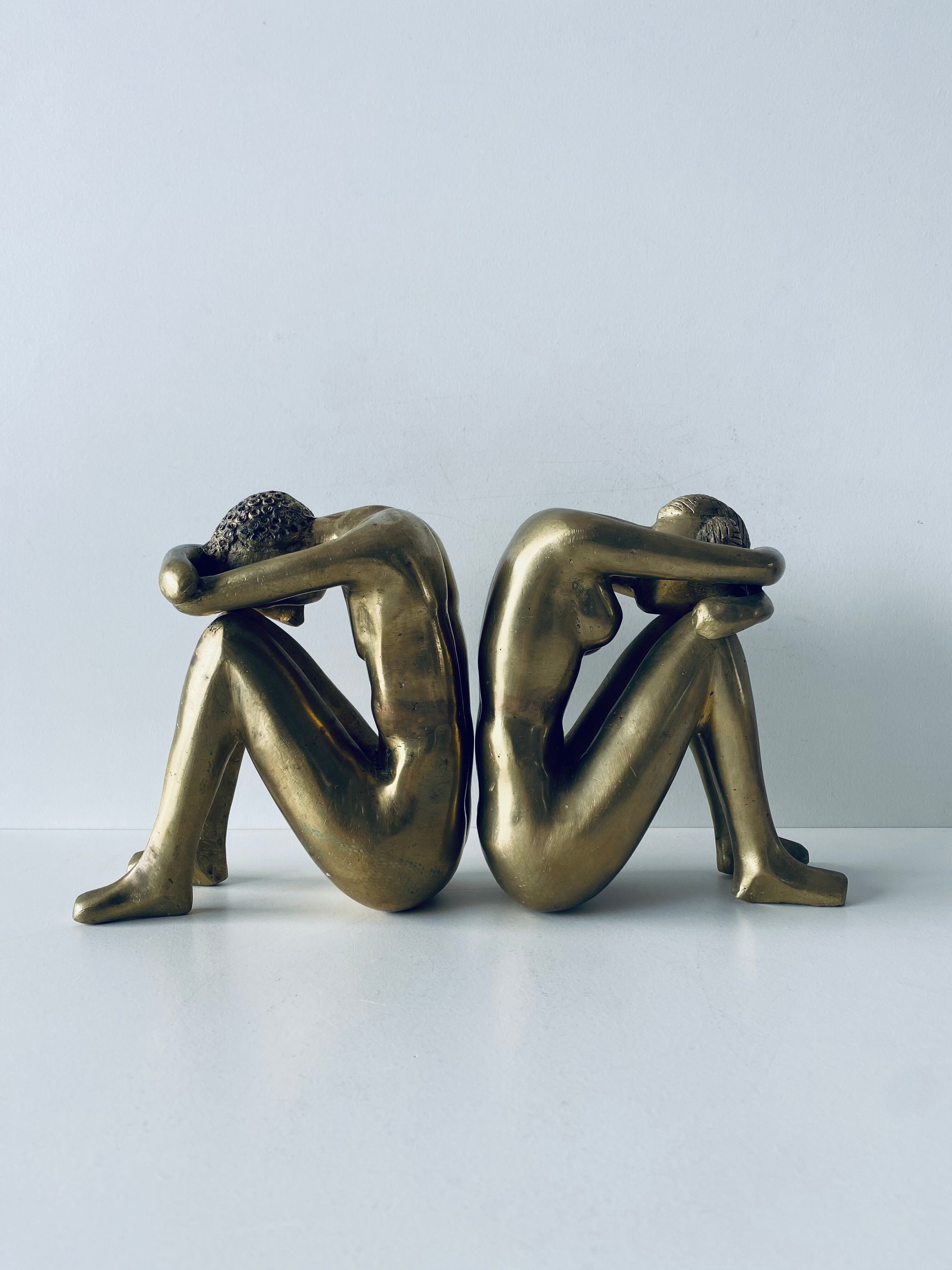 Couple carved in gilded bronze