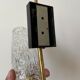 Gold metal and chiseled glass wall lamp