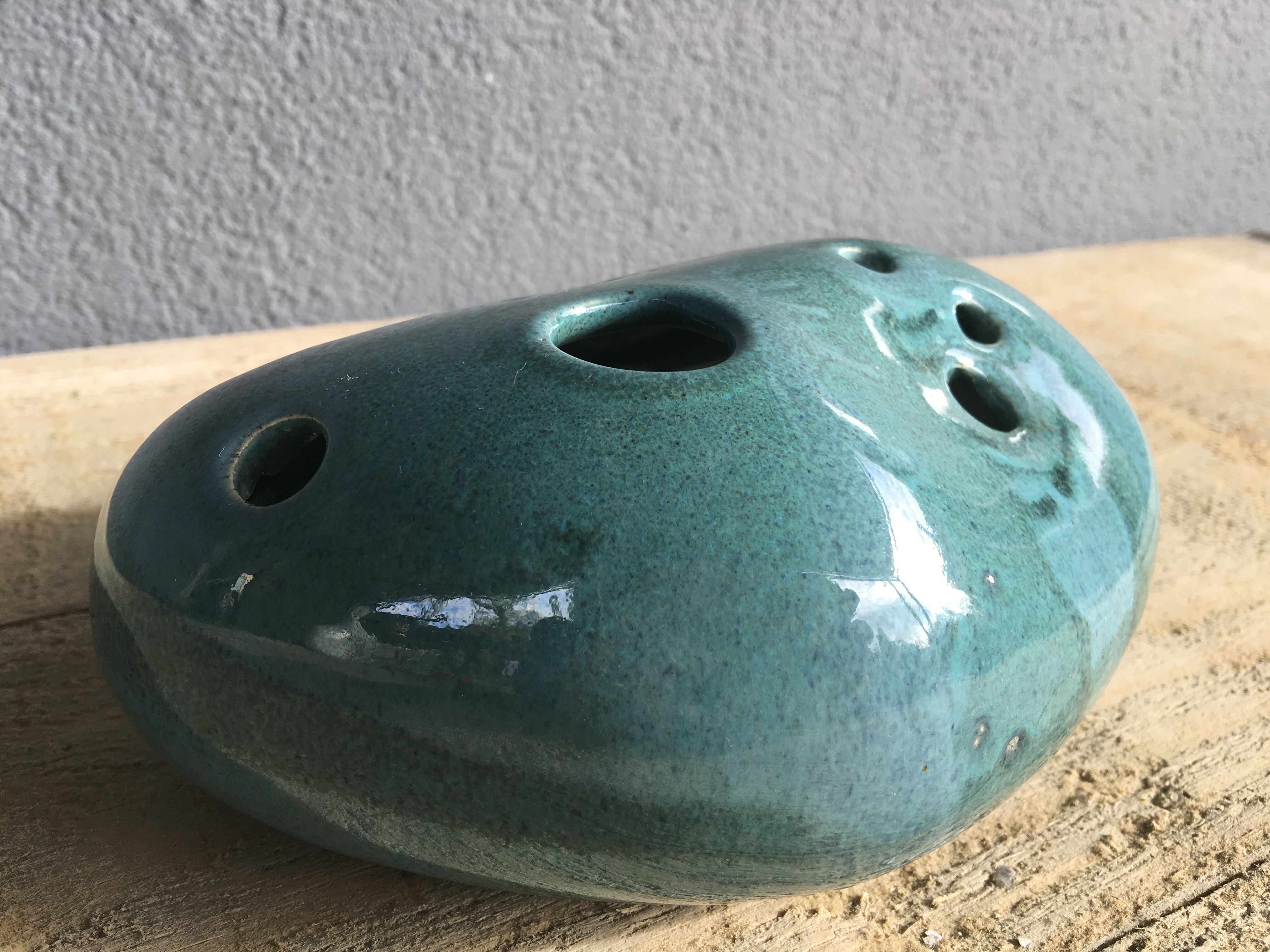 Roller spike flowers, blue-green ceramics