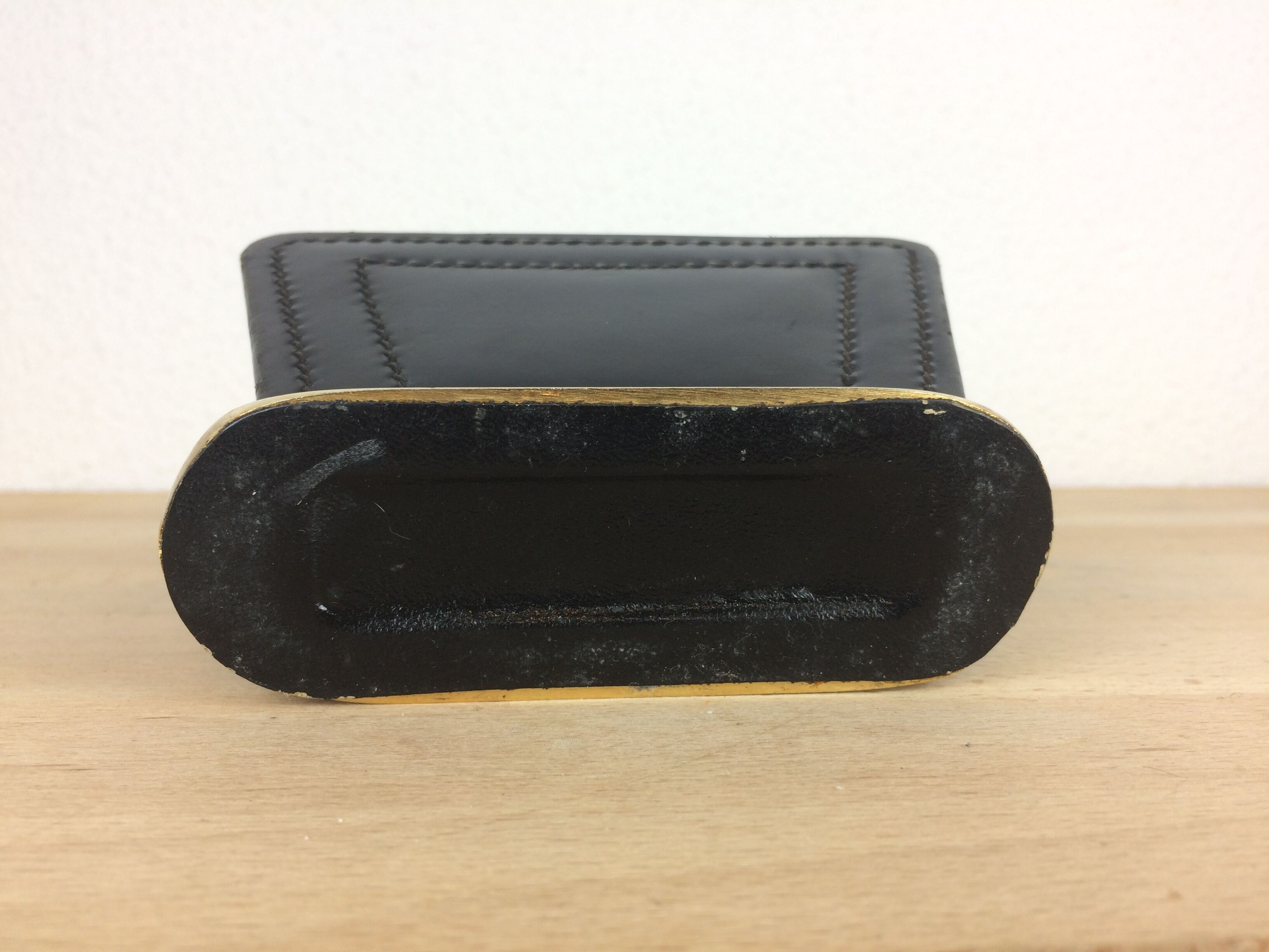 Longchamp letter holder in black leather and gold metal, 50s