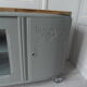 Art Deco furniture revisited in gray green and placed on wheels.