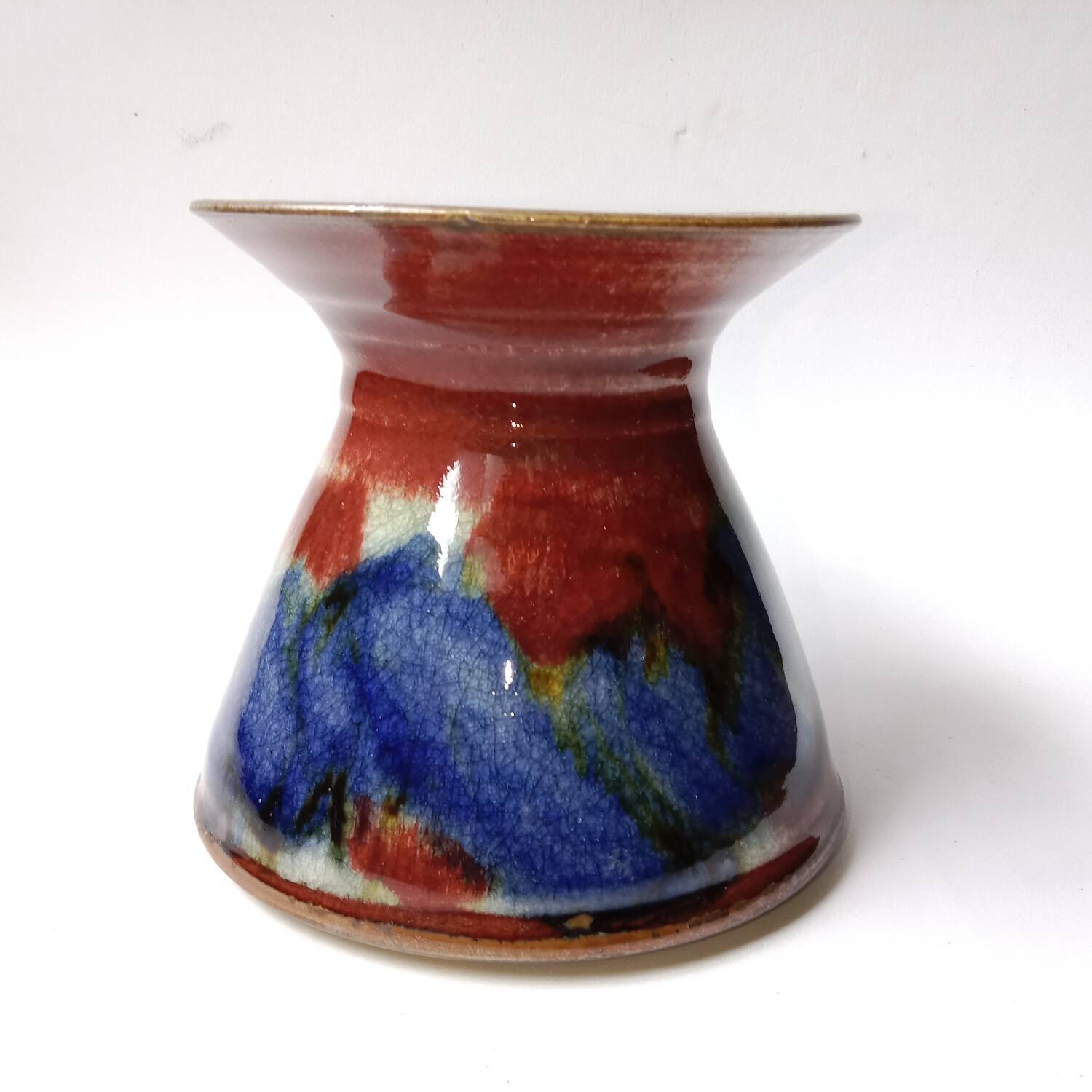 Red and blue glazed stoneware vase signed 12 cm