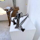 Pair of zoomorphic metal andirons "dogs" 1950