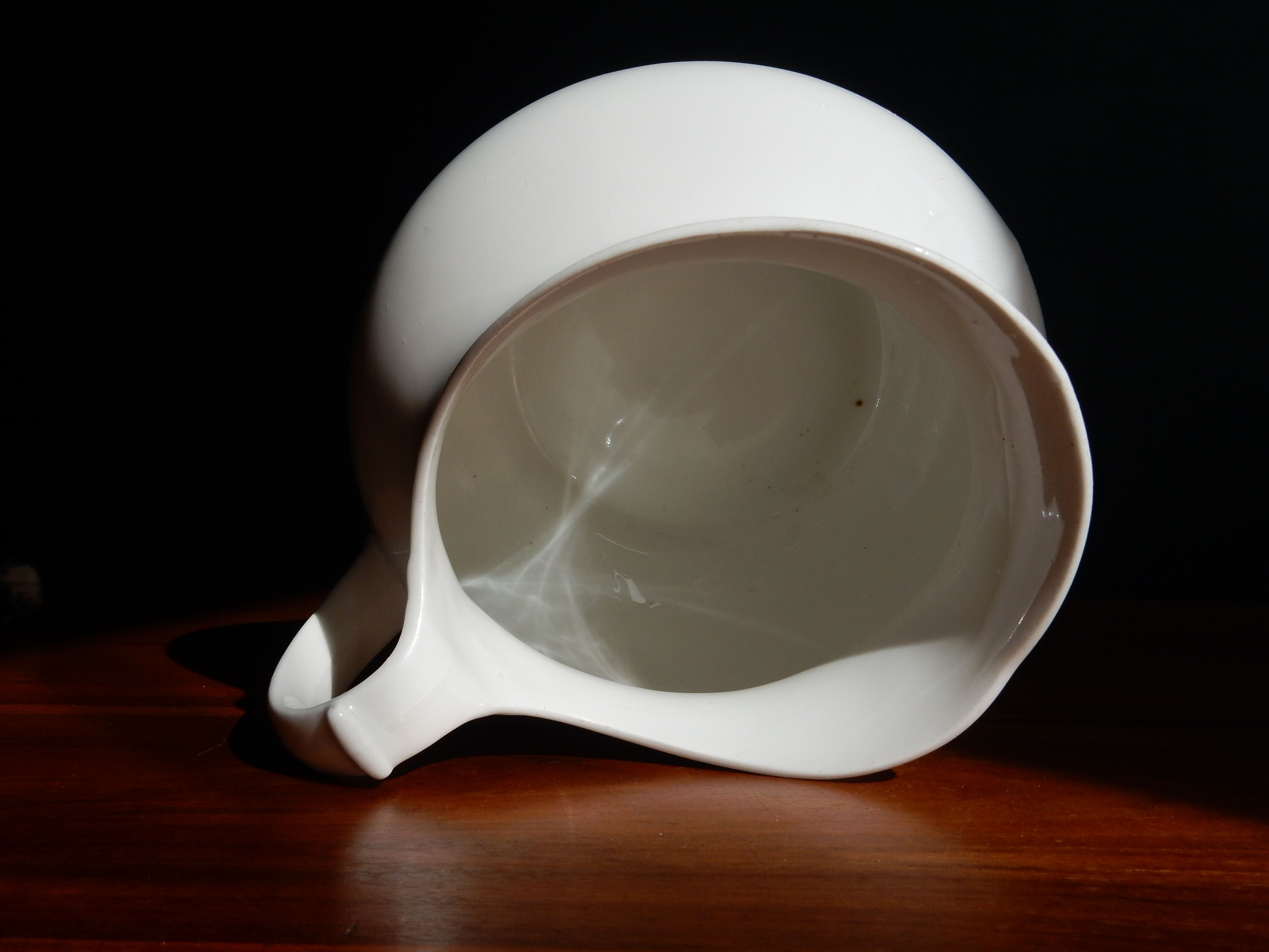 White ceramic water pitcher broc pot