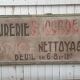 former big wooden advertising sign