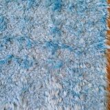 Set of two vintage sky blue rugs from the 70s