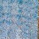Set of two vintage sky blue rugs from the 70s