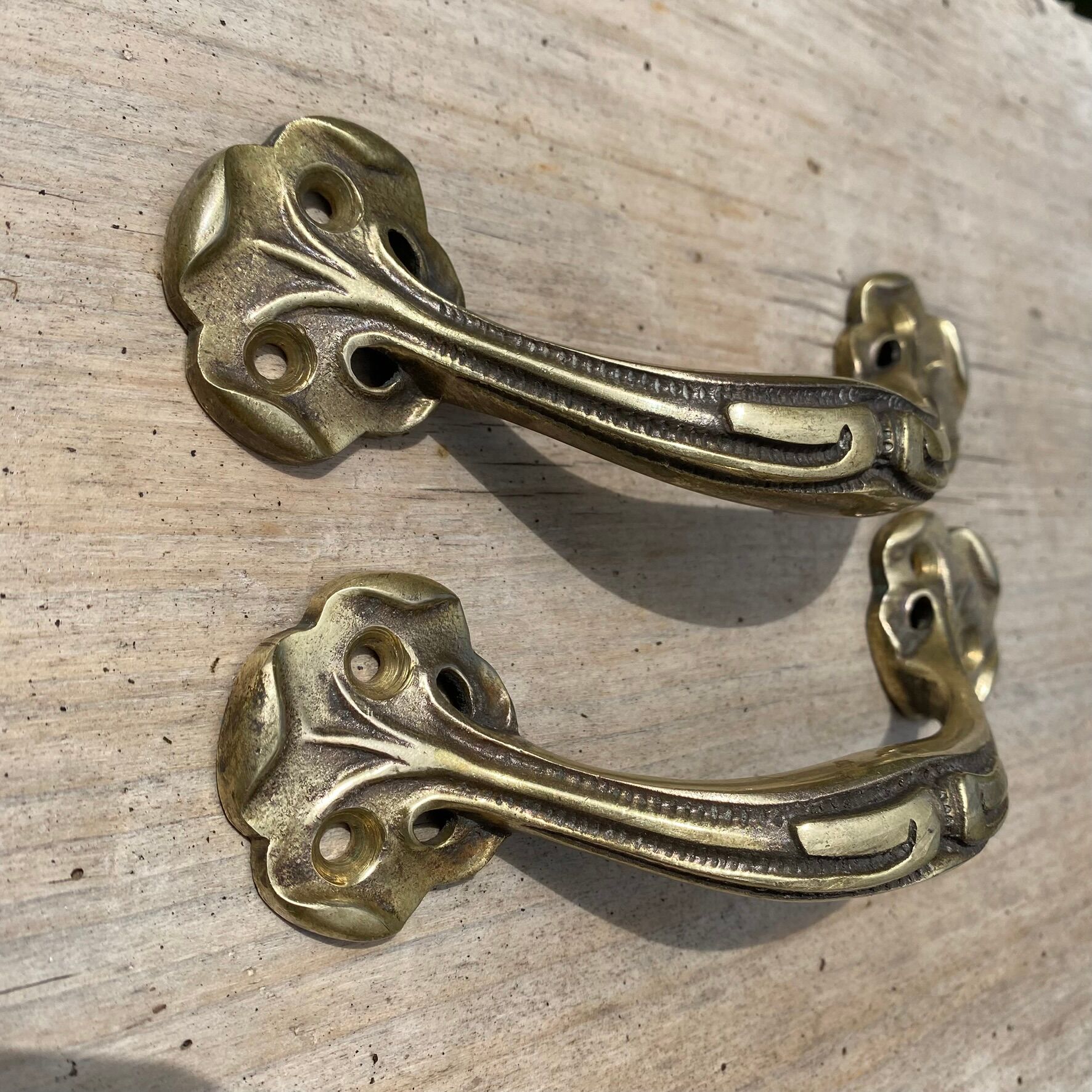 Pair of antique Art Nouveau brass handles