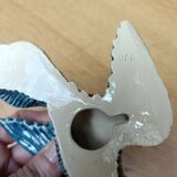 Two exotic birds in slip to hang