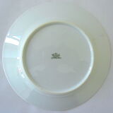 Suite of twelve table plates in white and gold porcelain.