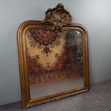 Old French fireplace mirror with beautiful ornament