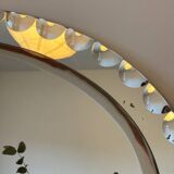 Vintage oval decorative mirror with beveled and chiseled effect