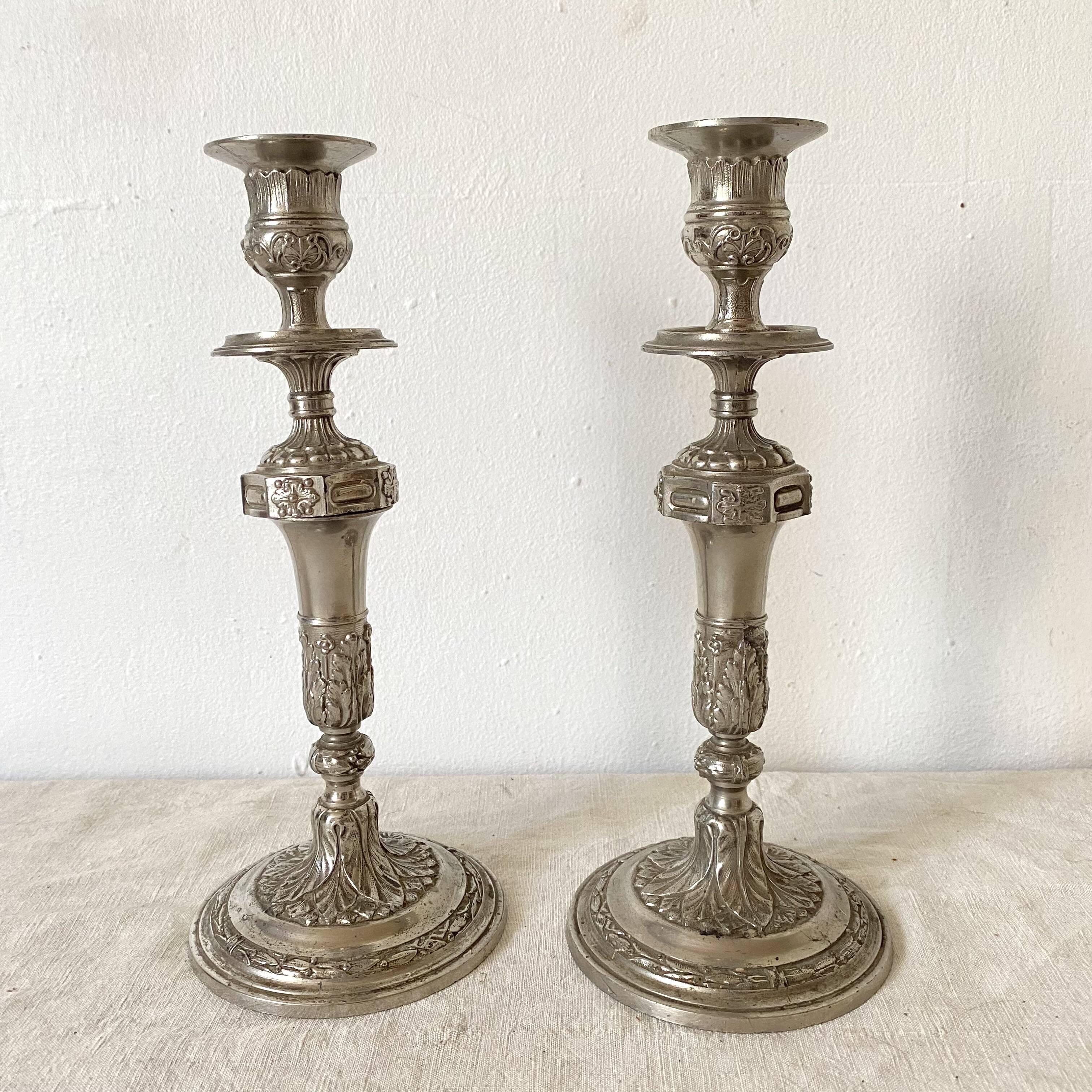 Pair of old silver-plated candlesticks