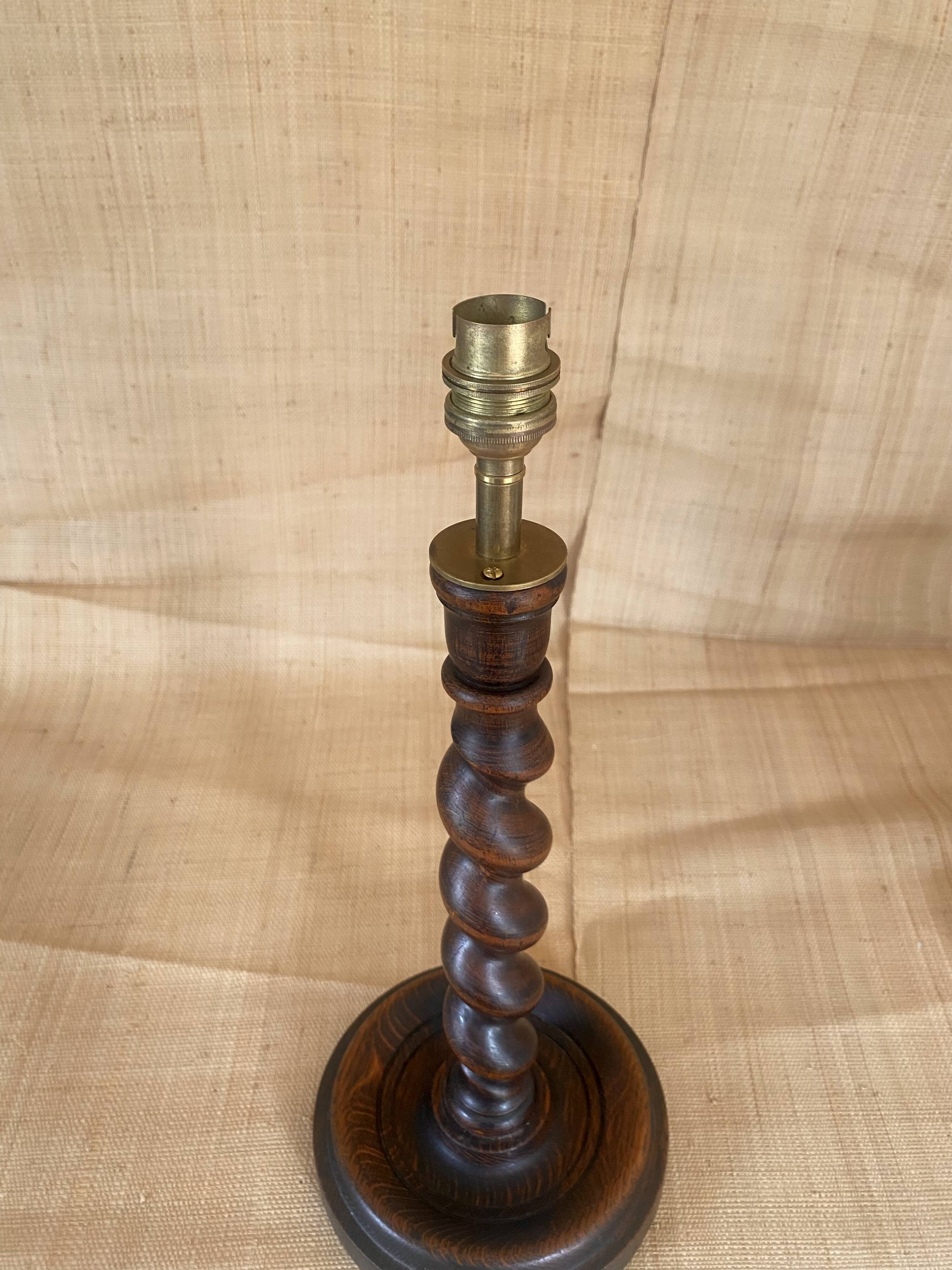 Turned wooden lamp base, fabric cable
