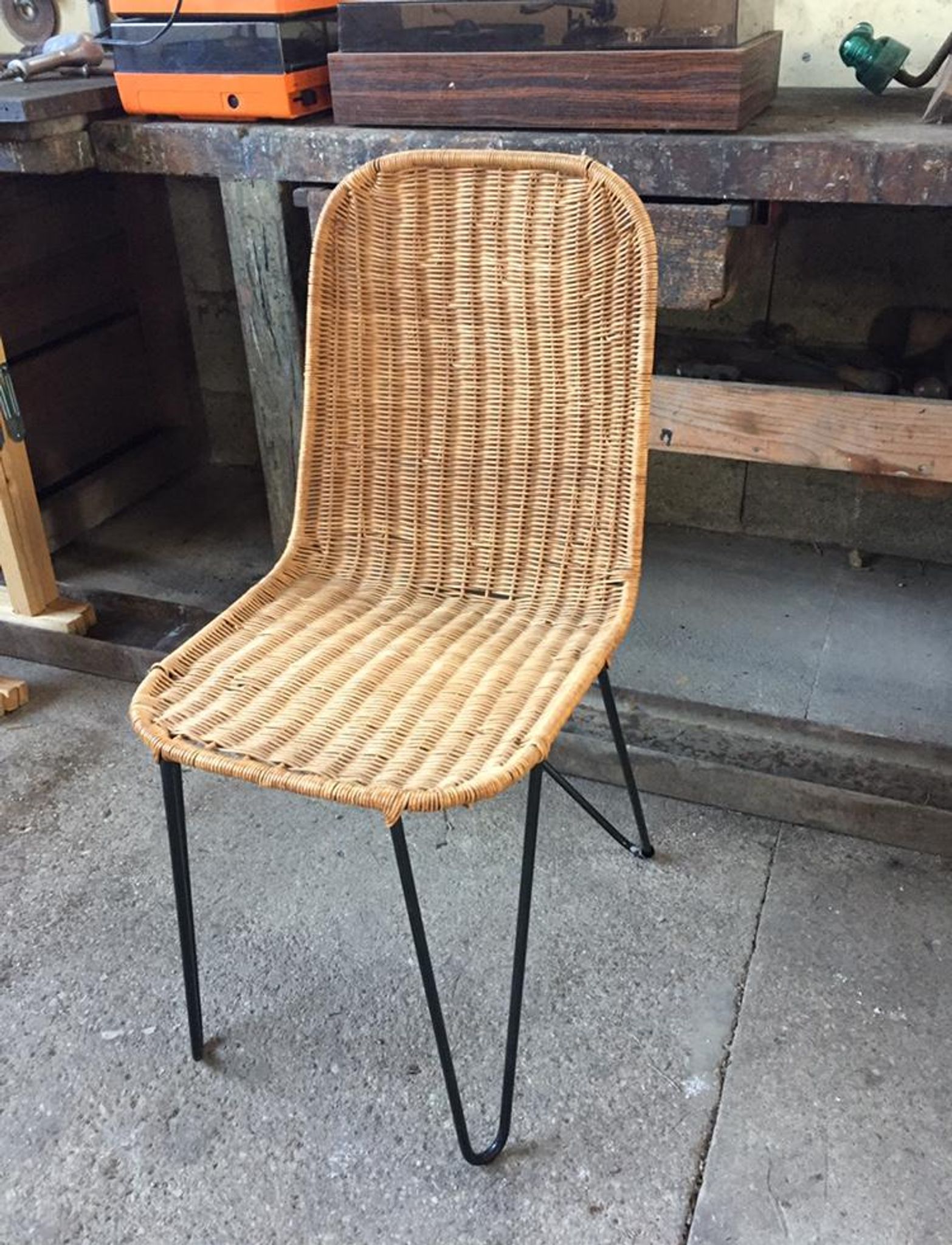 raoul guys chair in rattan and metal base year 50