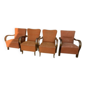 Set of 4 Art Deco armchairs in brown and coral with curved wood and upholstery fabric.
