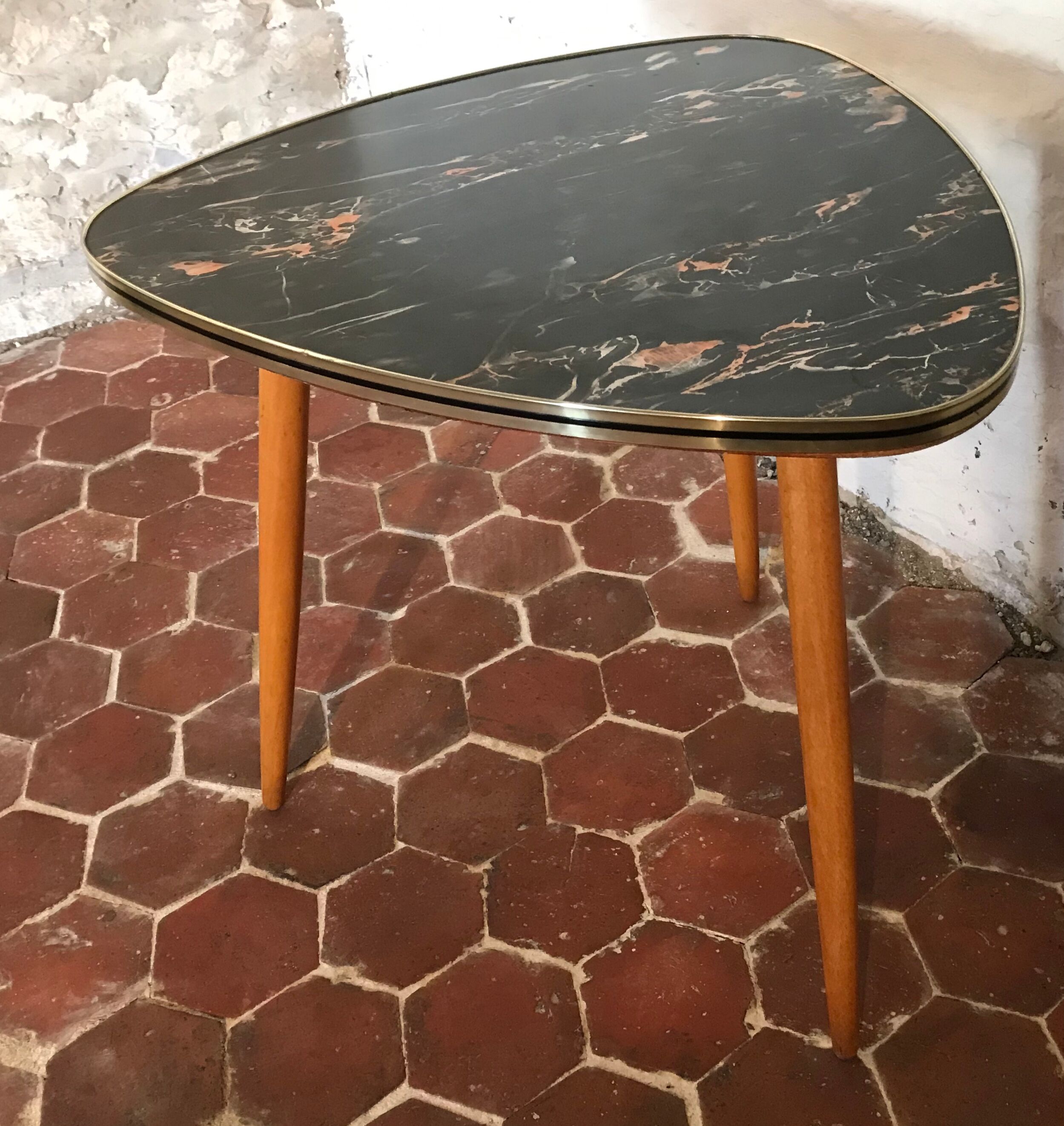 Free-form tripod coffee table
