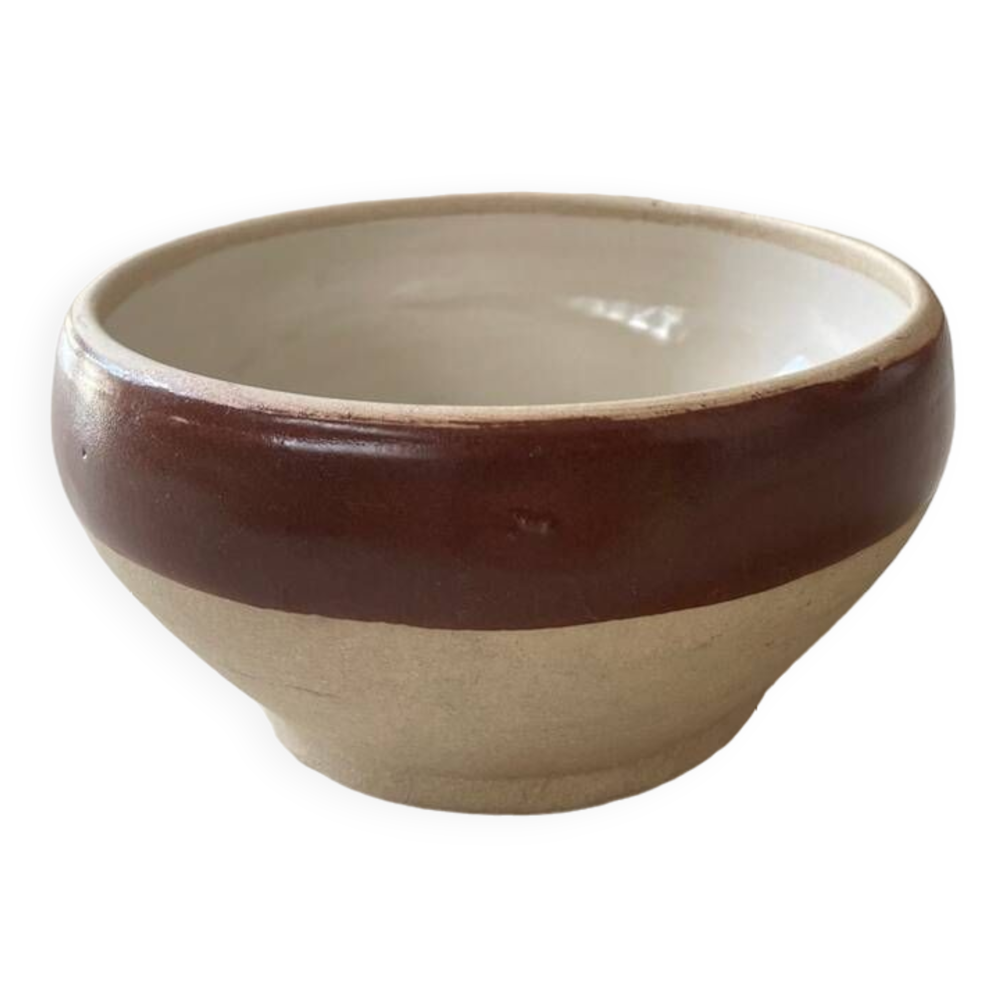 Old stoneware bowl with brown edge