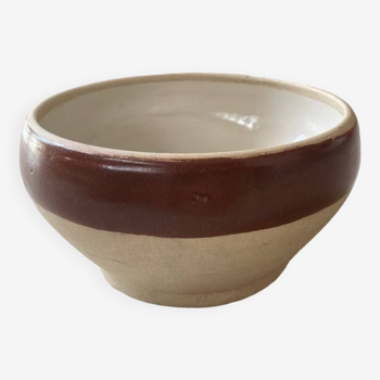 Old stoneware bowl with brown edge