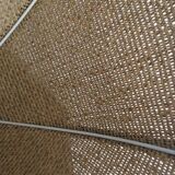 Two-tone flower hanging in braided straw.