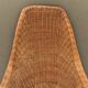 Fauteuil vintage en osier tressé