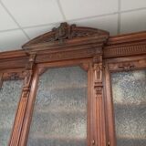 Glass-fronted walnut bookcase