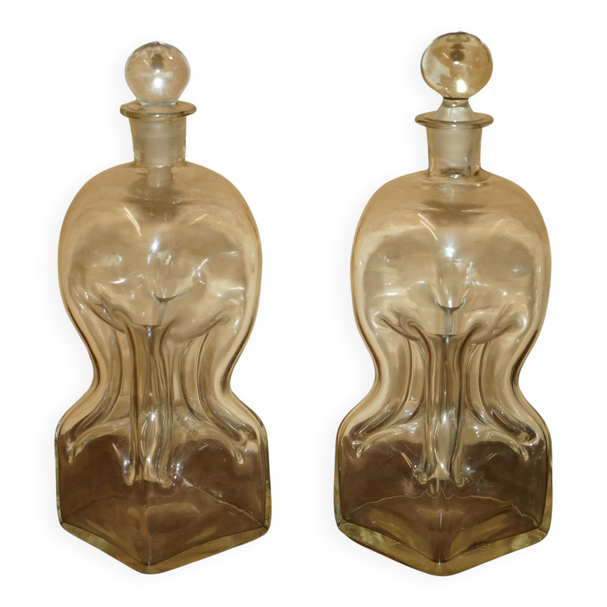 Pair of antique pinched decanters circa 1900 for serving whisky, bourbon, vodka, gin.
