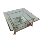 Golden coffee table and vintage Hollywood Regency glass