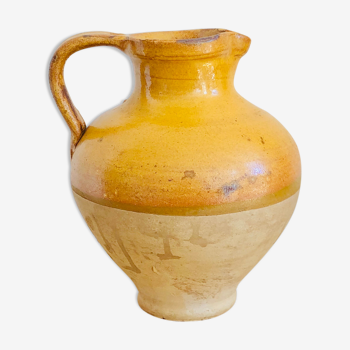 Vintage jug in glazed earth