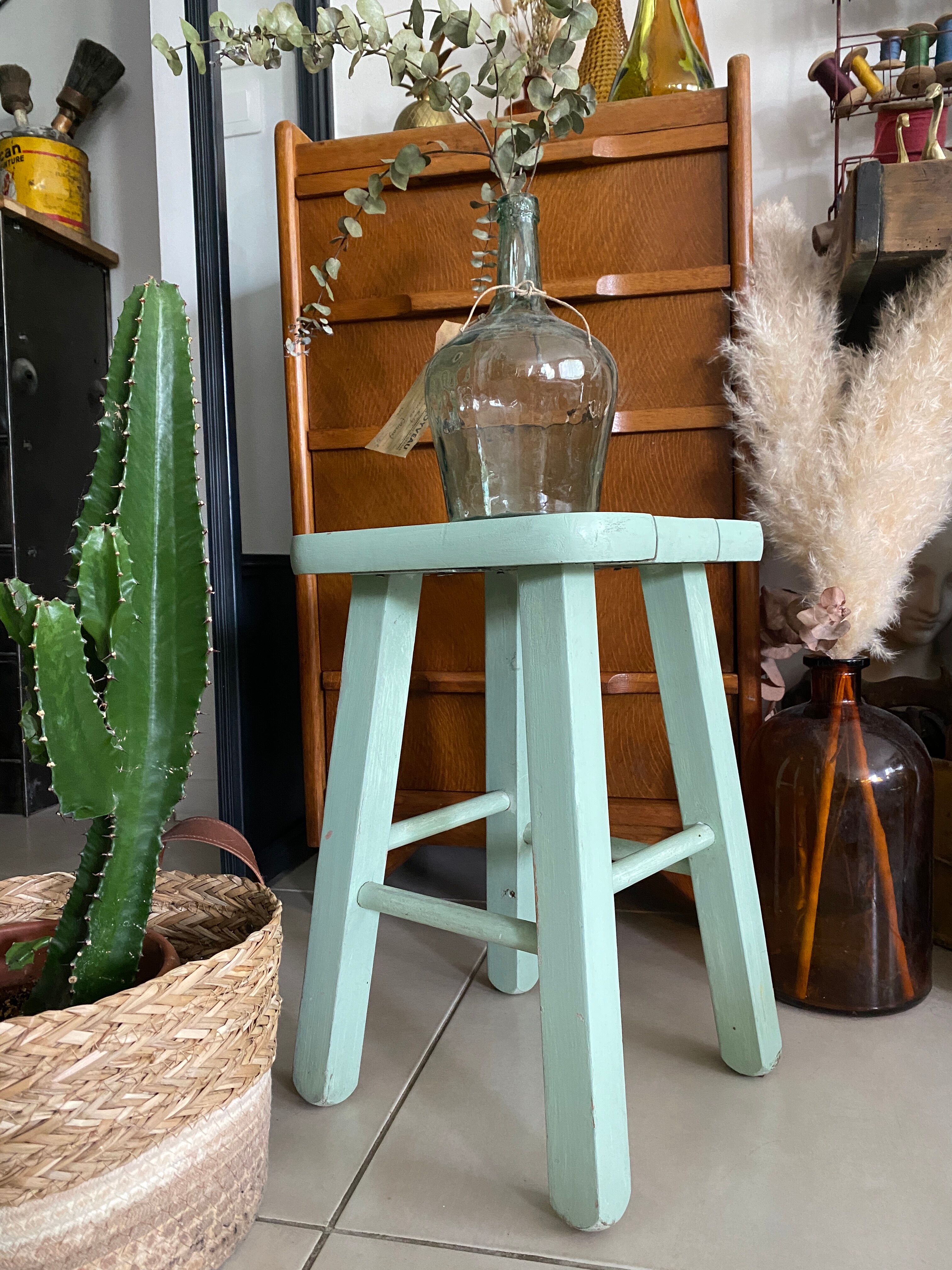 Old almond green wooden stool
