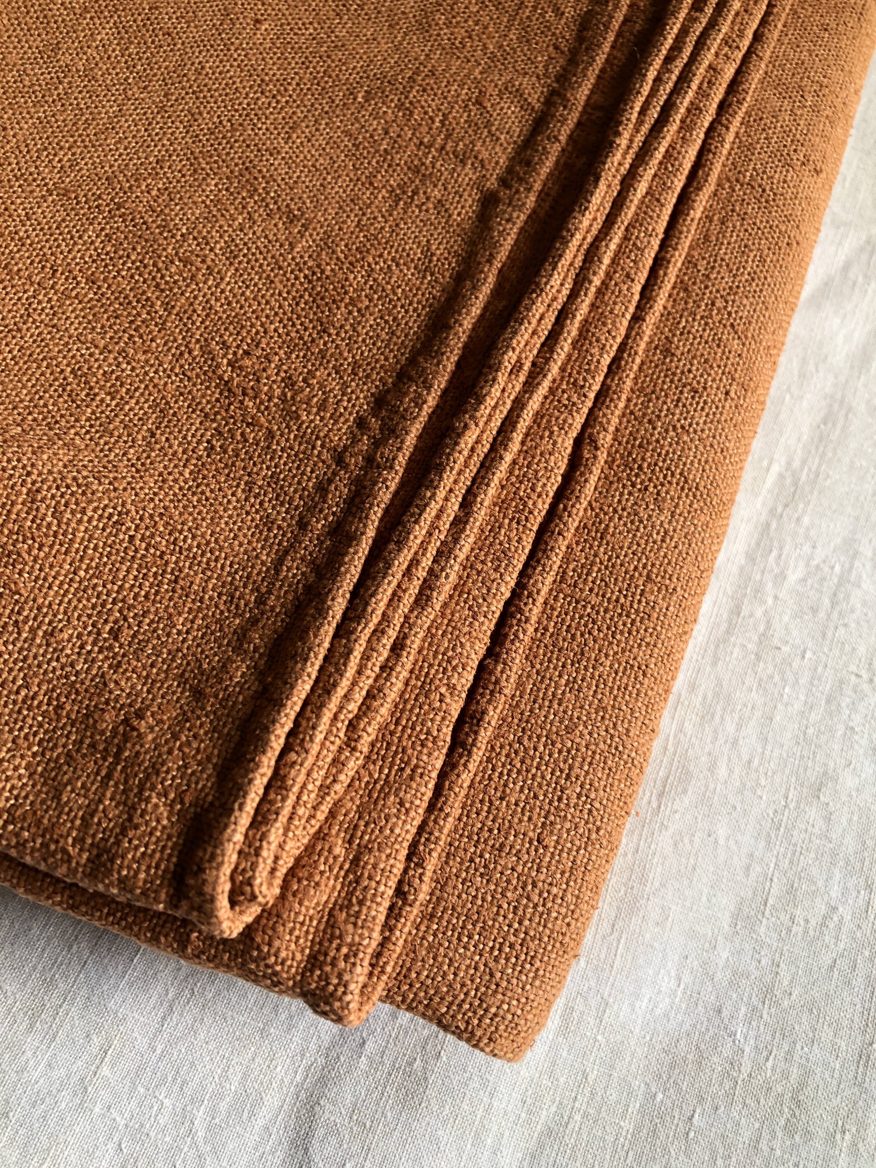 Old harvest tablecloth in terracotta tinted hemp