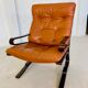Vintage Scandinavian cognac lounge chair by Oddvin Rykken