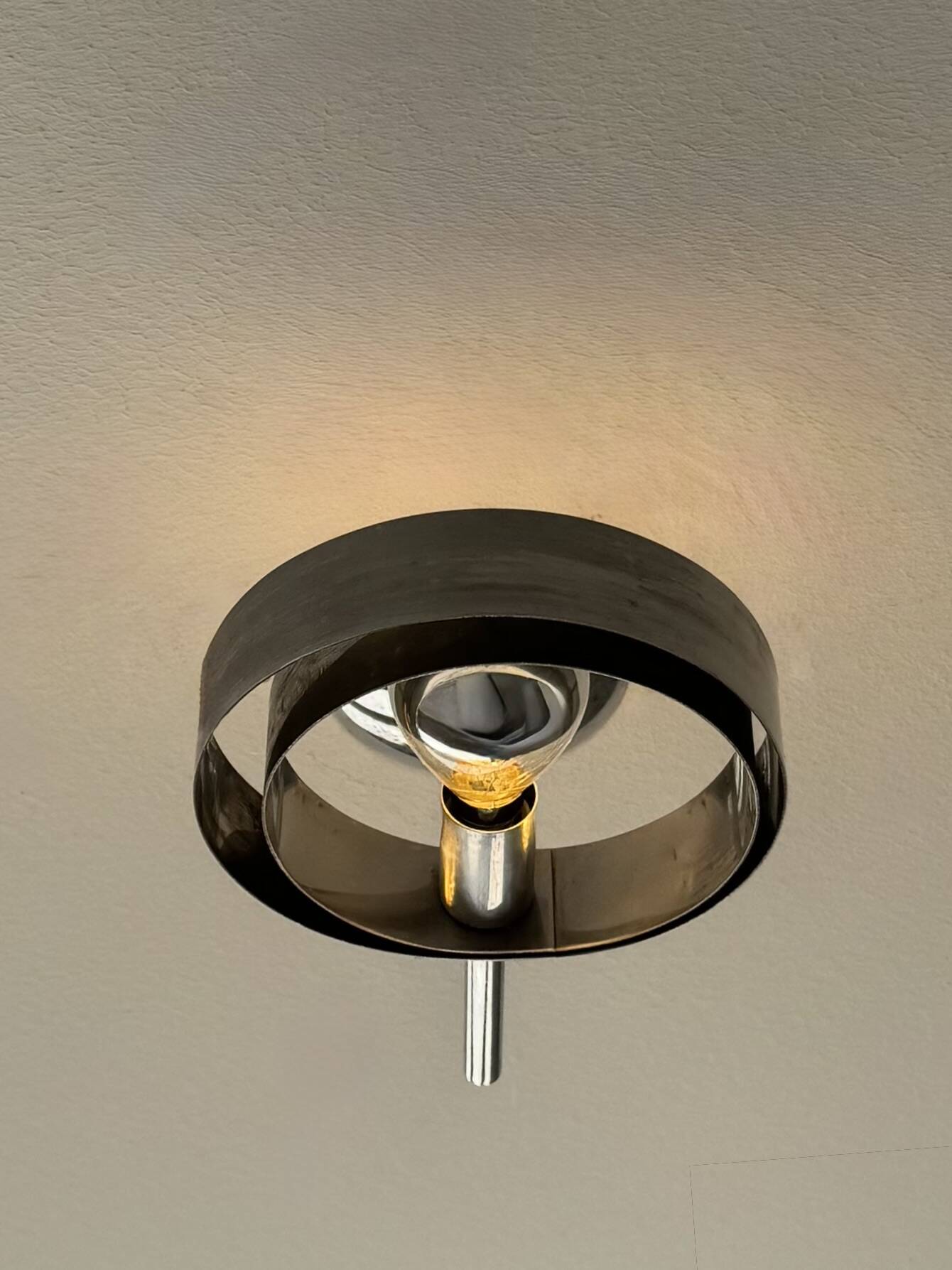 Pair of vintage chrome metal wall lights, France, 1970.
