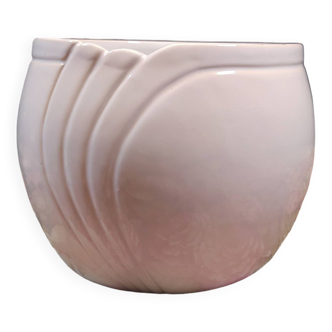 White ceramic ball-shaped plant pot
