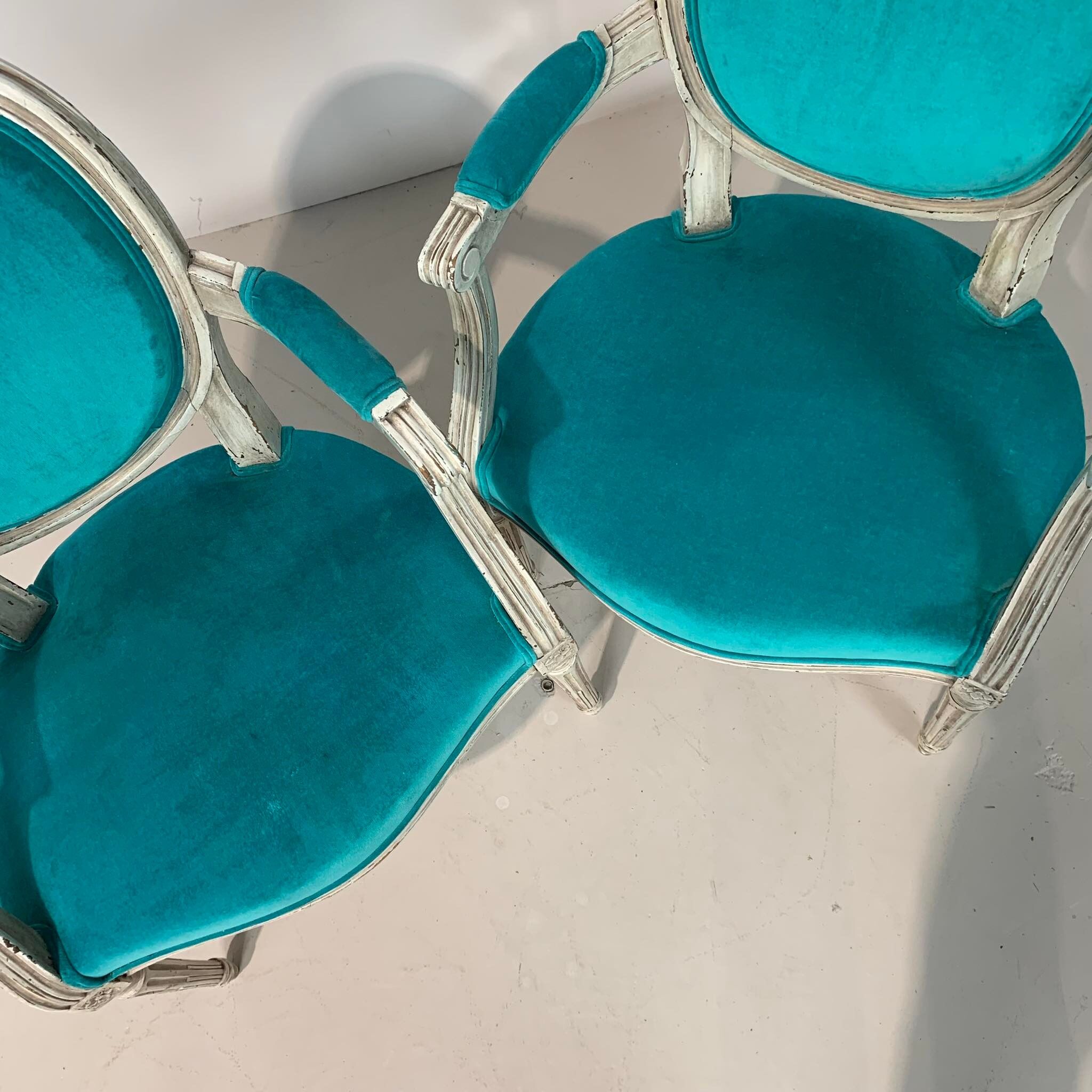 Pair of Louis XVI convertible armchairs