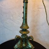 Lampe pique cierge bronze tripodes décor aigle