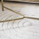 Coffee table in gold metal and glass