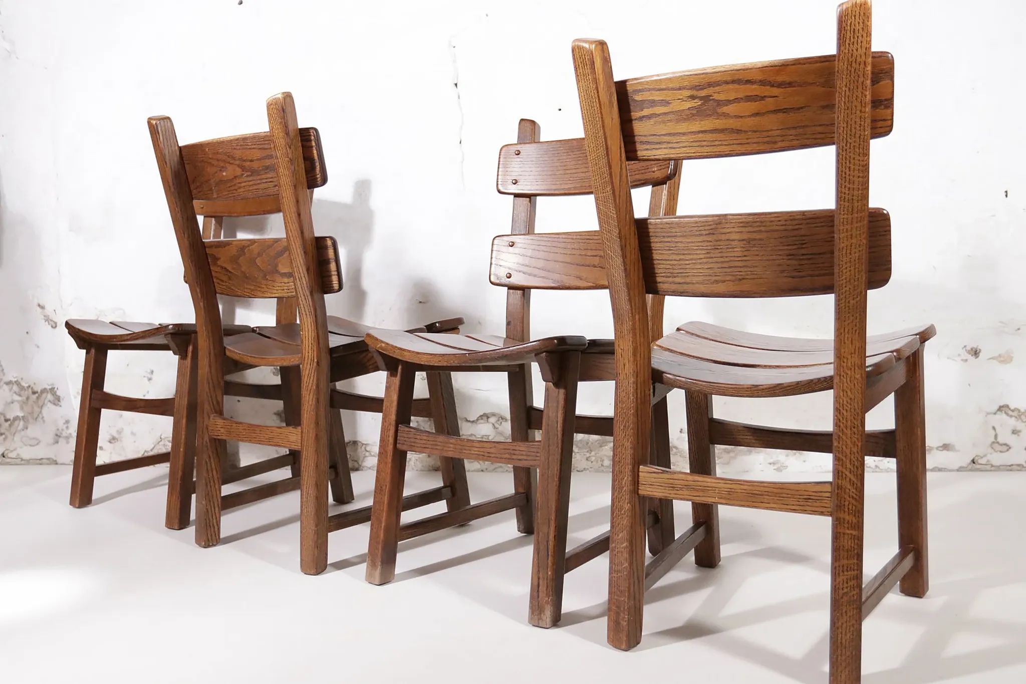 Set of 4 brutalist oak ladderback dining chairs – Netherlands, 1970s