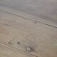 Antique English drop-leaf dining table made of walnut with elegant legs