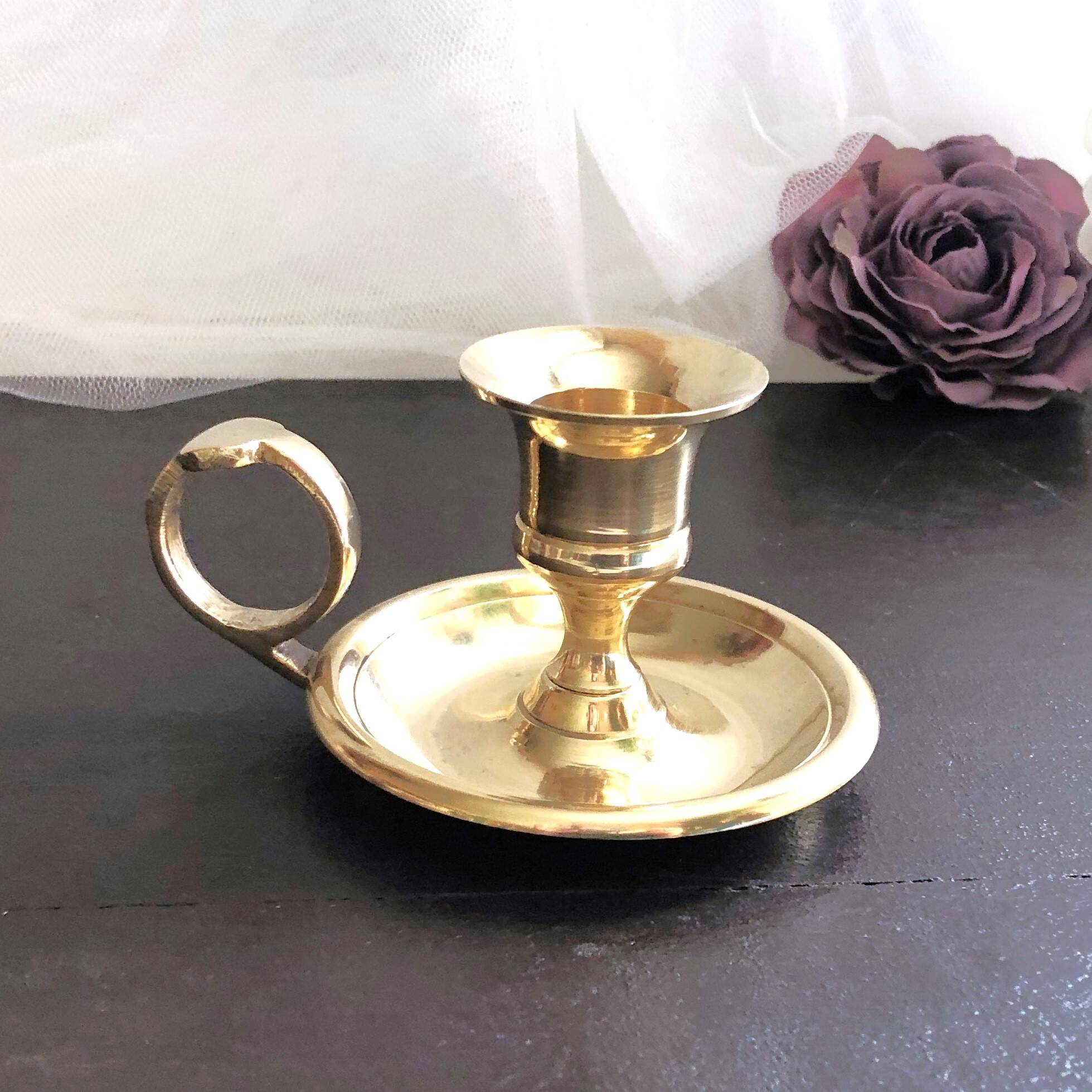 Hand candle holder called "Cave Rat" vintage golden brass