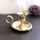 Hand candle holder called "Cave Rat" vintage golden brass