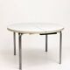 Vintage round extendable dining table, white laminate on chrome legs.