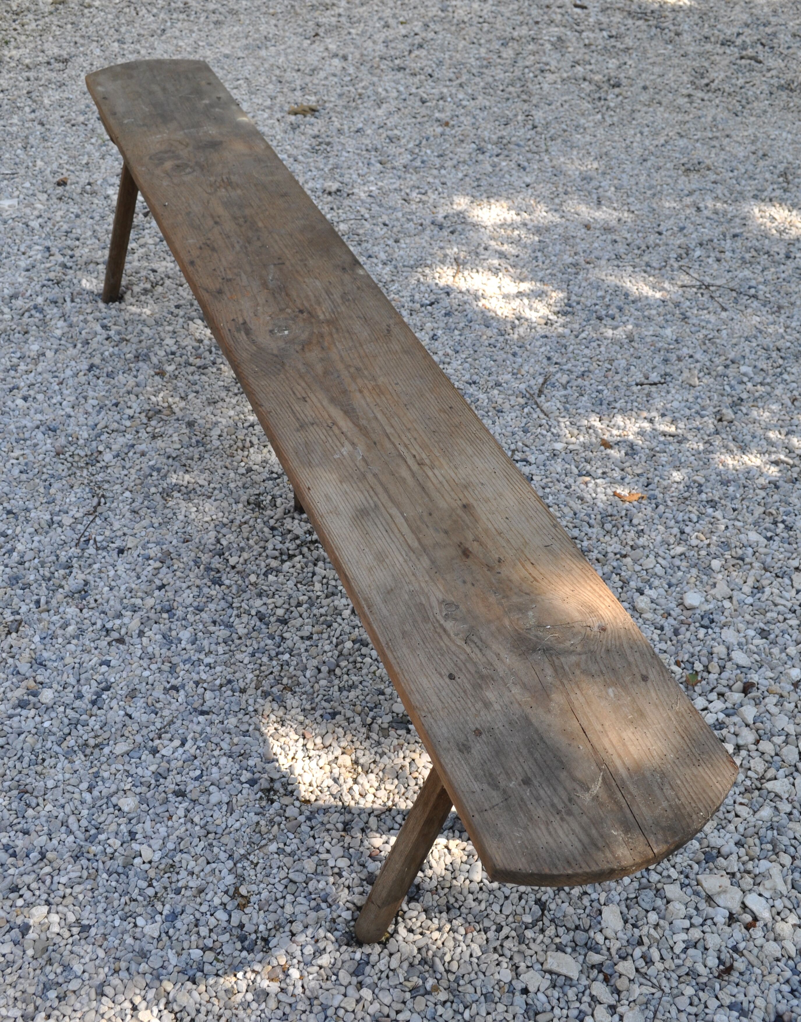 Rustic bench with central foot