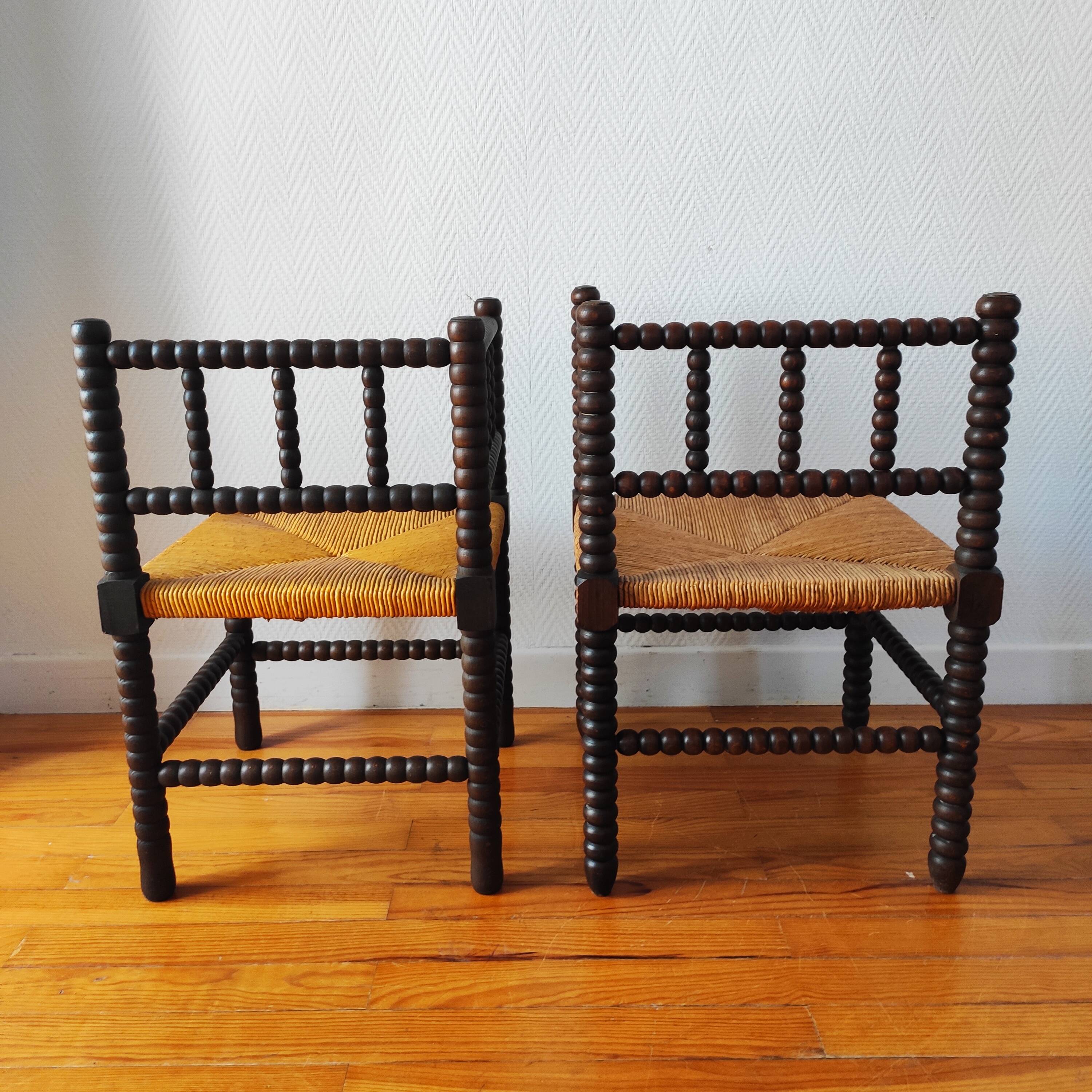 Pair of French corner chairs - turned wood, mid-20th century.