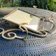 Wall-mounted gilded wrought iron coat rack with mirror