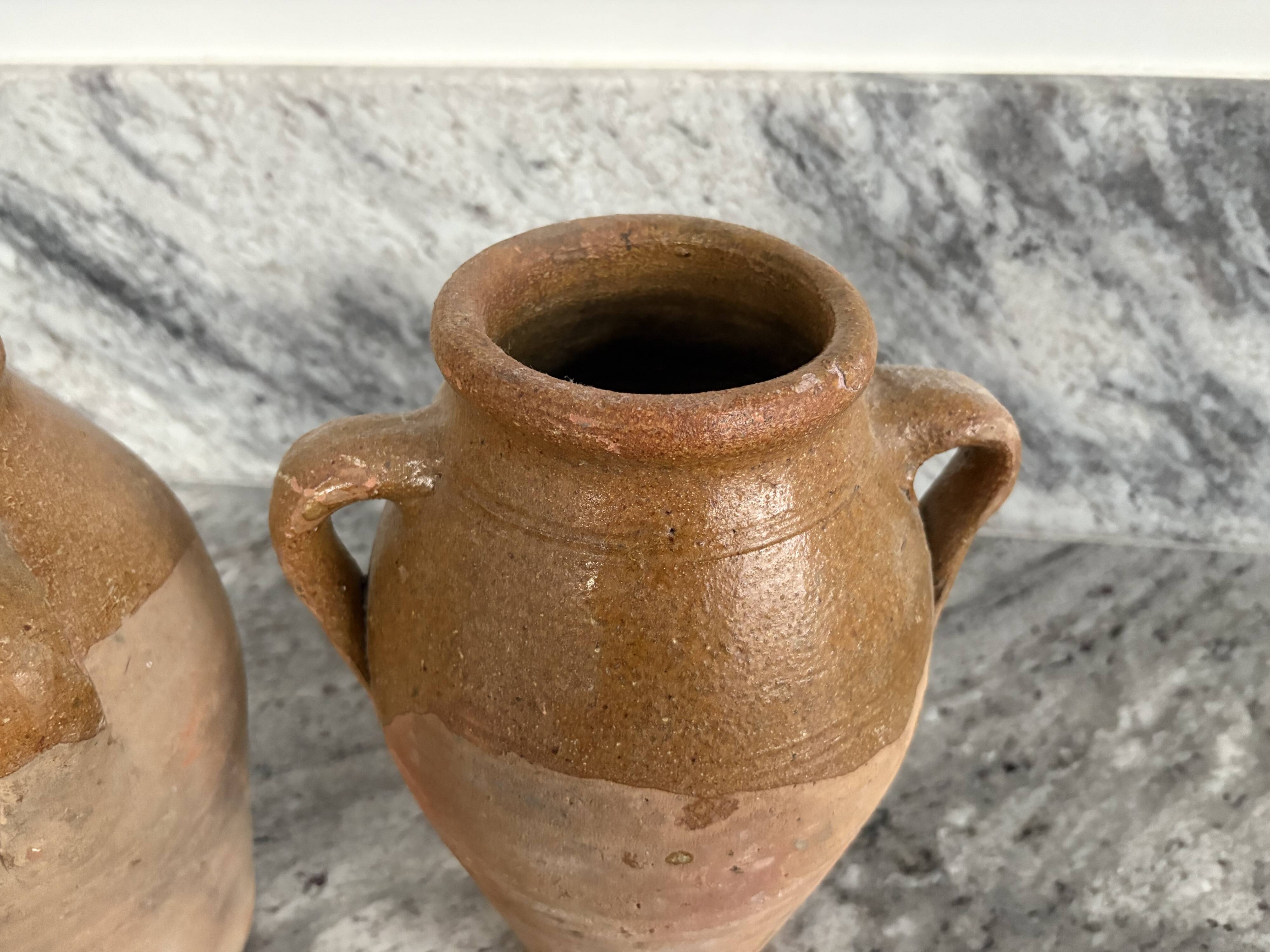Pair of Provençal enamelled terracotta jars