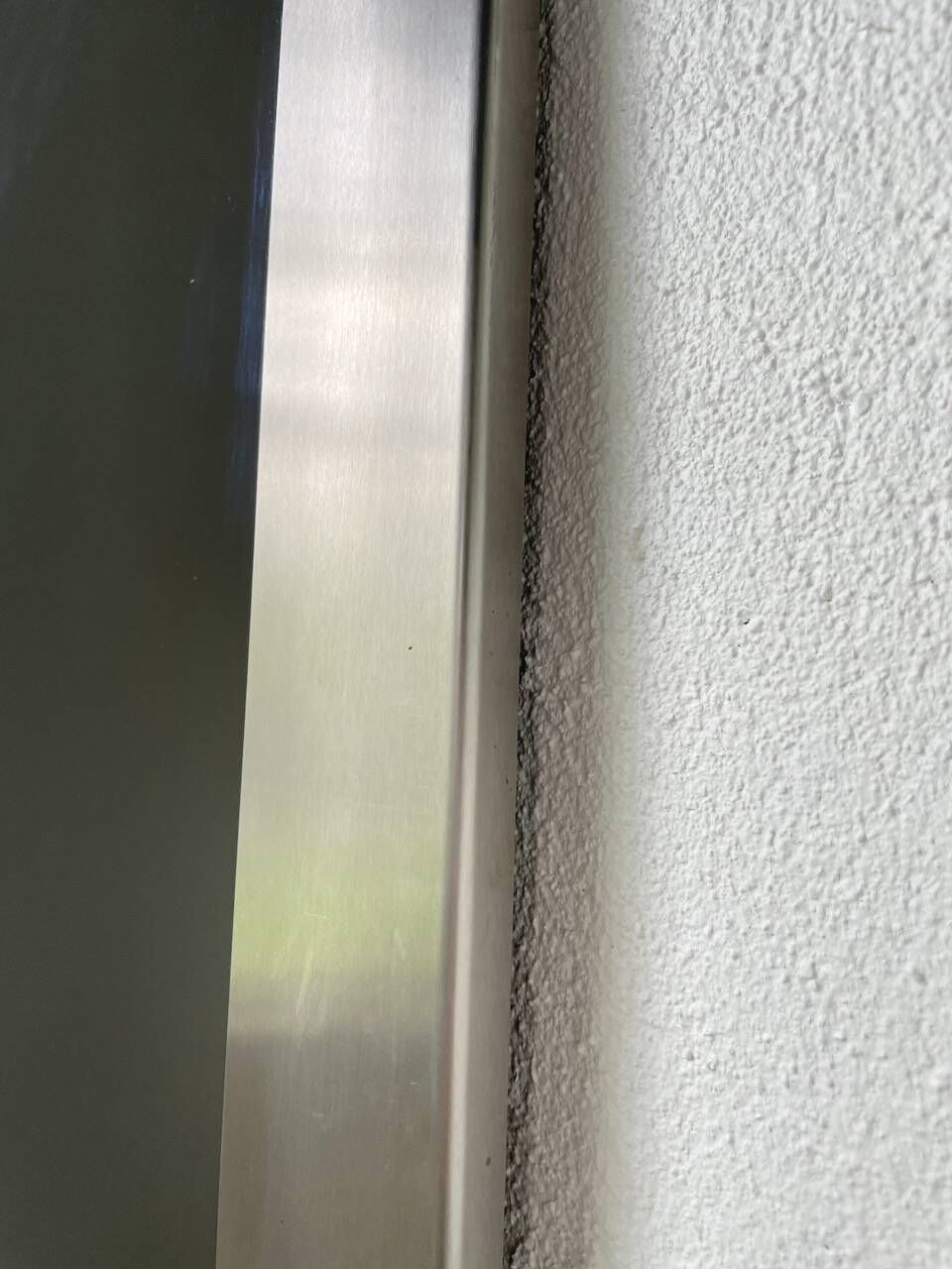 Brushed stainless steel mirror circa François Monnet and Joelle Ferlande