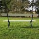 Old wooden garden bench and vine cast iron foot