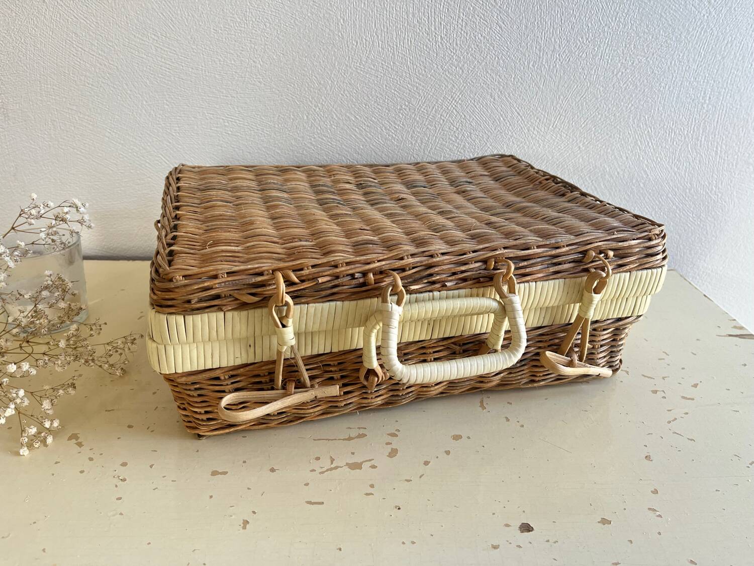 Vintage woven wicker suitcase